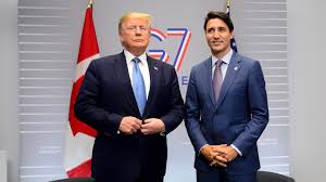 President-elect Donald Trump and Canadian Prime Minister Justin Trudeau pose together at an official meeting during the G7 summit.